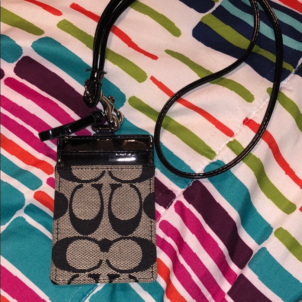 Coach lanyard card holder.